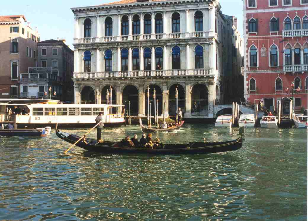 A Gondola and Vaporetto on the Grand Canal