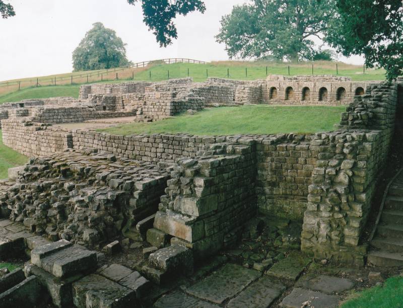 The Bath House with the apodyterium and the latrine in the foreground