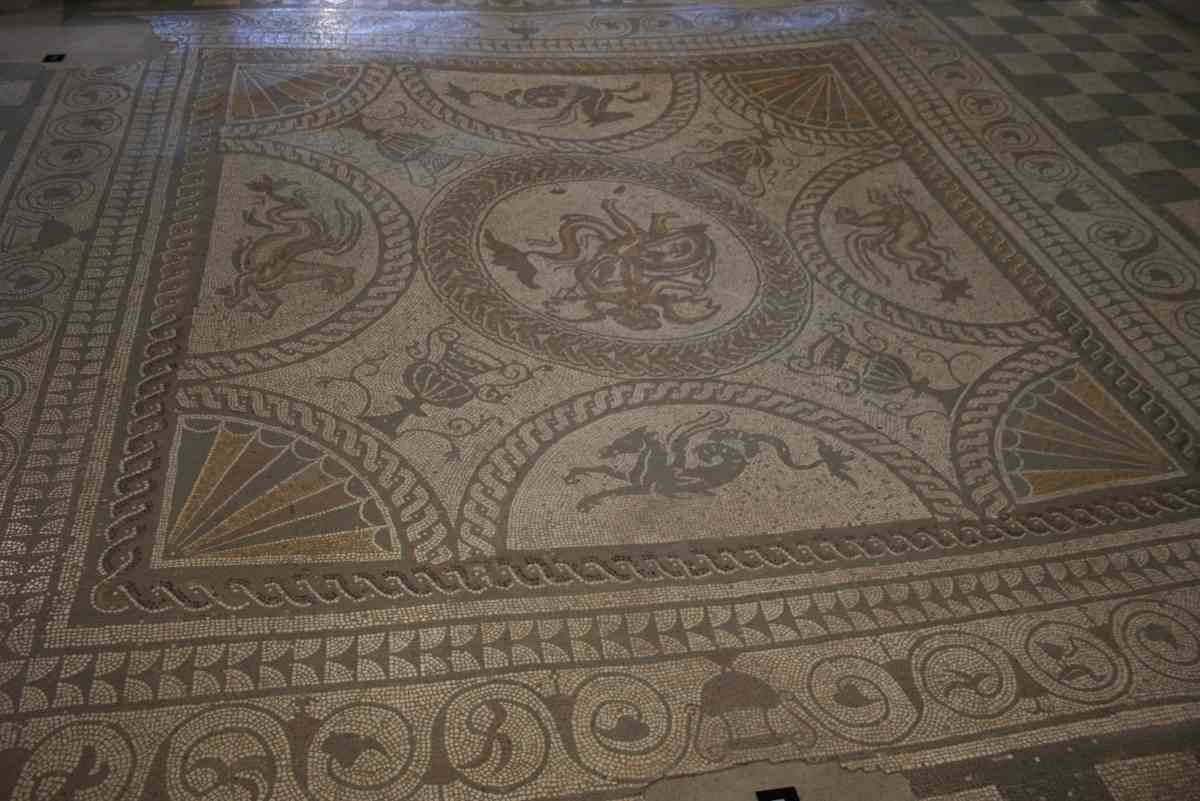 Cupid on a dolphin mosaic